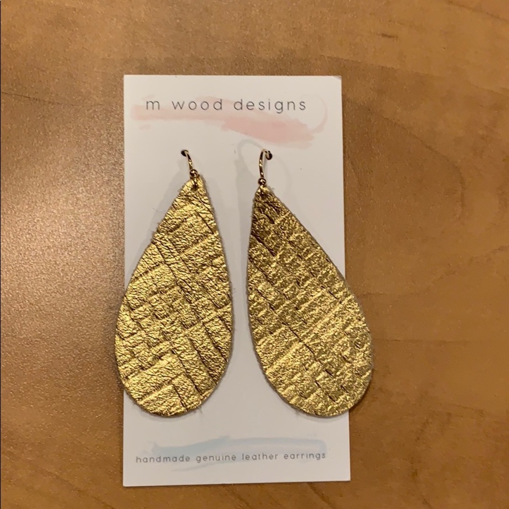 NWT gold leather earrings